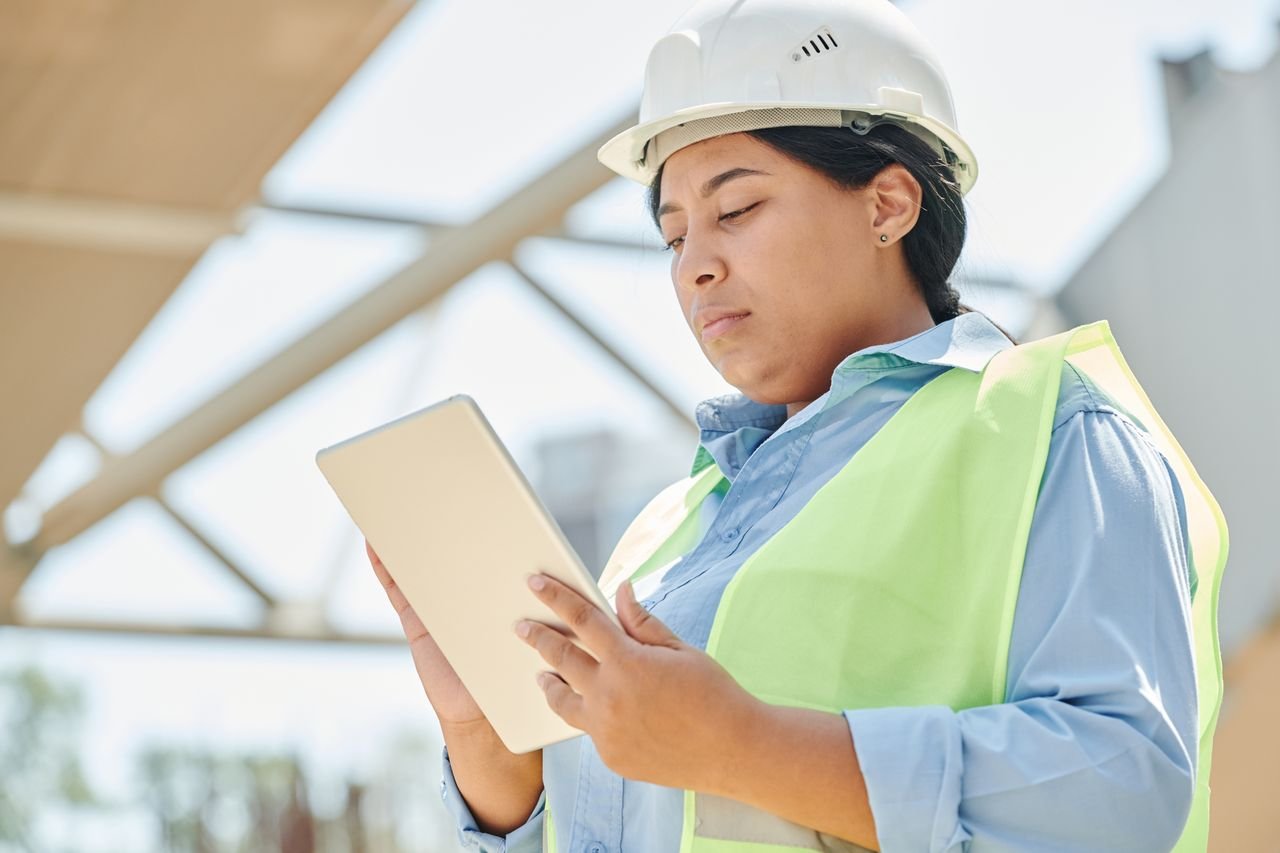 Service business professional preparing an estimate on a digital tablet