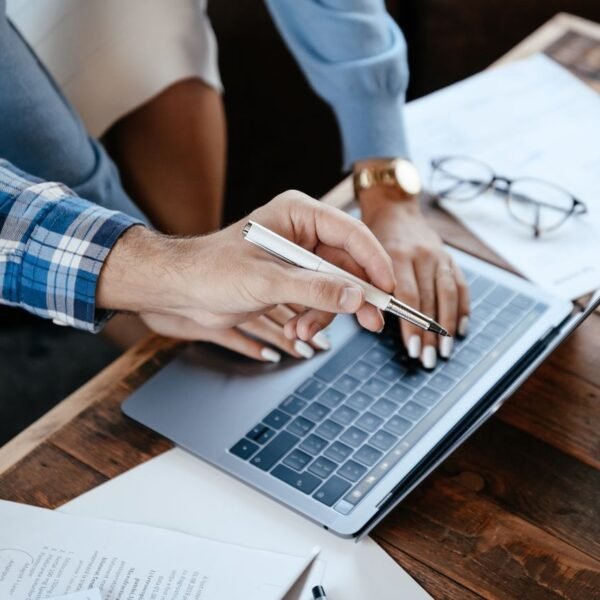 New hire completing digital onboarding paperwork on a laptop